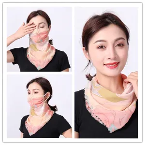 Detail view of breathable floral chiffon sun protection face mask and neck gaiter for women