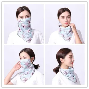 Detail view of a floral chiffon sun protection face scarf mask for outdoor activities.