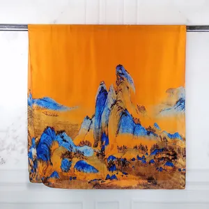 Detailed view of an ethnic style silk-like scarf featuring a vibrant landscape painting.