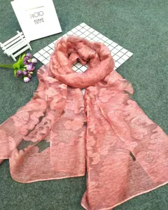 Detailed view of the elegant pink floral scarf with delicate tie-dye gradient effects