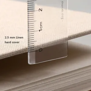 Close-up view of 2.5 mm thick linen hard cover professional sketchbook with measuring ruler