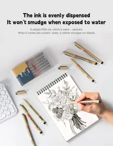 Professional waterproof black fineliner drawing pens used for detailed floral sketching