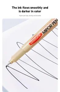Professional black fineliner pen tip showing smooth waterproof ink flow on paper