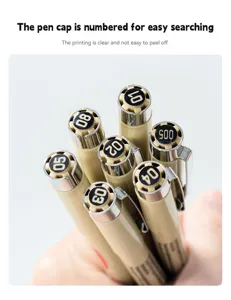Close-up of black fineliner pen caps with size numbers for easy identification