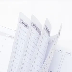 Detailed view of an English weekly planner notebook with 52-week layout and to-do list