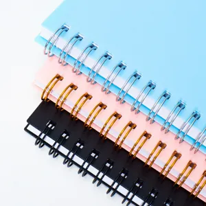 Professional spiral weekly planner notebooks with durable metal coils in three colors