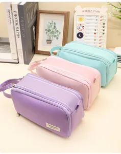 Geräumige Federmäppchen aus Canvas in Pastellviolett, Rosa und Mintgrün mit Doppelreißverschluss