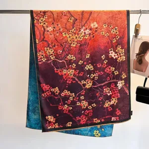 Detail of Xiangyunsha silk scarf with double-sided floral print and hand-rolled edges