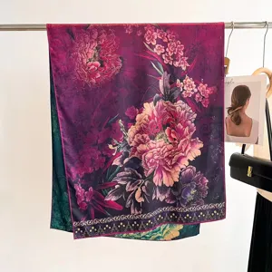 Detail of mulberry silk scarf with double-sided floral print and hand-rolled edges