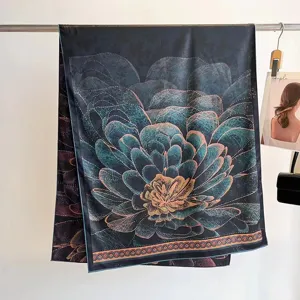 Detailed view of vintage mulberry silk scarf with lotus floral print and hand-rolled edges