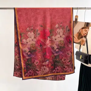 Detail view of retro floral mulberry silk scarf with birds and hand-rolled edges