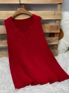 Detailed view of a red sleeveless tank top featuring a stylish scalloped V-neckline.