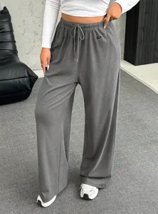 Detail of women's gray drawstring wide-leg casual pants with comfortable elastic waist.