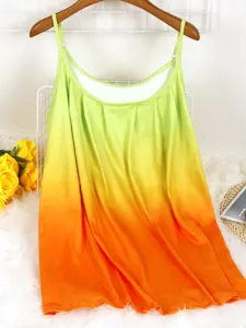 Detailed view of women's pleated spaghetti strap tank top with green and orange gradient