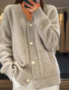 Detailed view of the stylish women's beige V-neck knit cardigan with buttons.
