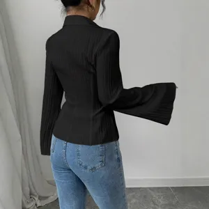 Back view of elegant black long-sleeve ribbed shirt with flared sleeves and slim fit