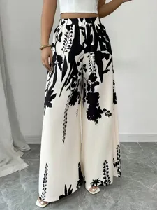 Elegant high waist wide-leg trousers with stylish black and white botanical floral print