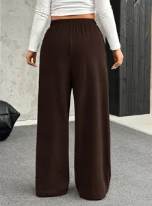 Back view of women's comfortable brown wide-leg casual pants with high elastic waist