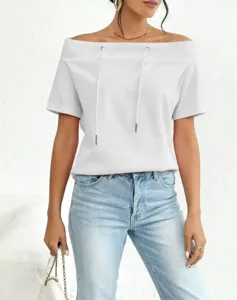 Close-up detail of the white off-shoulder sweatshirt top featuring adjustable drawstrings.