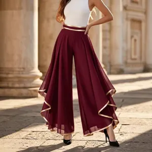 Elegant burgundy high-waisted chiffon wide-leg pants featuring a gold contrast trim and tiered hem