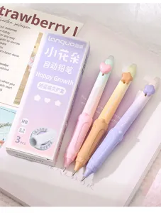 Macro view of three Languo mechanical pencils with heart star toppers and soft grips