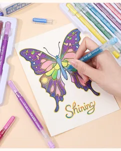 Close-up view of vibrant glitter gel pens coloring a detailed butterfly drawing