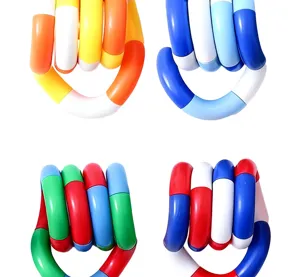 Close-up of four colorful Tangle fidget toys for sensory play, ADHD, and stress relief.