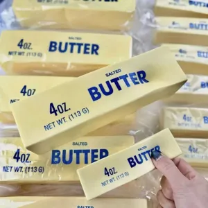 Realistic yellow butter stick squishy toy for stress relief with a soft slow rebound texture