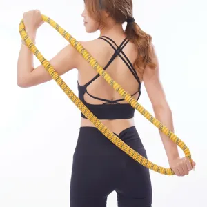 Hula hoop con resorte suave y pesado con funda de poliéster amarillo para cintura