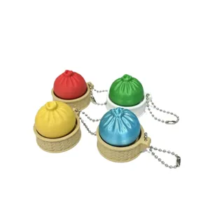 Set van kleurrijke 3D-geprinte baozi sleutelhangers in mini stoommandjes voor speelgoed