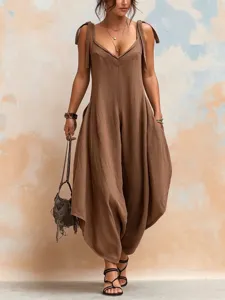 Loose brown V-neck sleeveless jumpsuit for women featuring functional side pockets