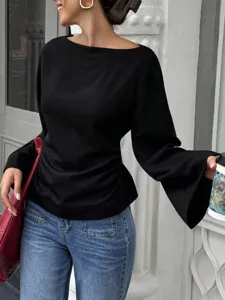 Elegant black boat neck top featuring long flared bell sleeves and a slim waistline