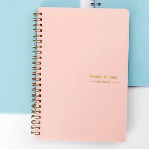 Pink non-dated spiral weekly planner notebook for 52-week scheduling