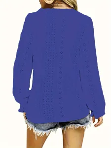 Back view of royal blue eyelet long sleeve top with casual pleated details for women