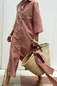Bohemian style women's orange geometric print shirt dress featuring a classic collar.