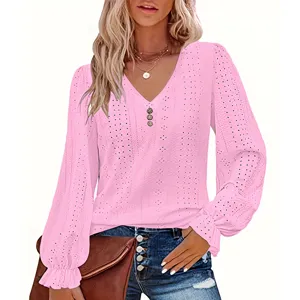Detailed view of women's pink V-neck hollow-out casual top with ruffled sleeves