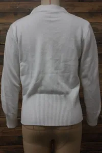 Detailed back view of a loose white women's knitted cardigan with ribbed hem texture