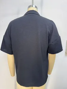 Back view of a women's loose short-sleeved lapel shirt in navy blue on a mannequin