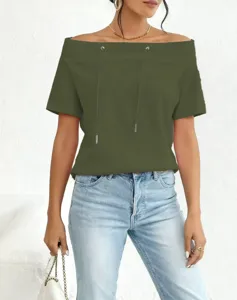Close-up detail of a stylish olive green off-shoulder sweatshirt with drawstrings