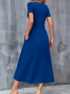 Back view of elegant royal blue short sleeve midi dress with side pockets for women