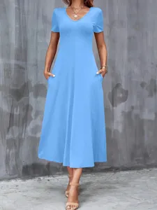 Close-up of casual sky blue V-neck short sleeve midi dress with functional pockets.