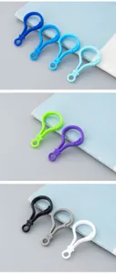 Macro detail view of colorful plastic bulb-shaped lobster clasps in various vibrant shades