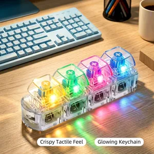 Juguete fidget de interruptor de teclado mecánico brillante con luces LED de colores