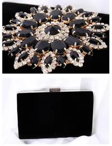 Detailed view of luxury black velvet evening bag with crystal sunflower decoration