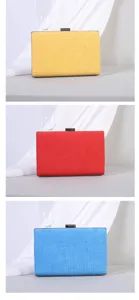Detailansicht eleganter Abendtaschen aus strukturiertem Stoff in Gelb, Rot und Blau