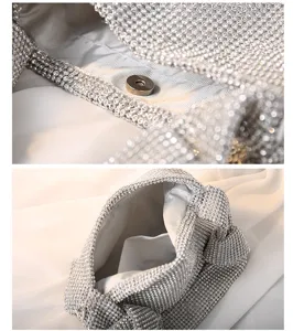 Detailed view of silver rhinestone evening bag showing magnetic closure and grey lining