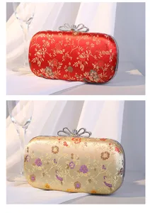 Zwei elegante Abendhandtaschen mit Blumenstickerei und Strass-Schleifenverschluss