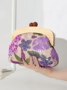 Elegant handmade floral embroidered straw clutch bag with sequins and wooden clasp handle