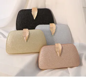 Collection of glittery evening clutch bags with gold leaf clasp detail in four colors