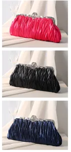 Elegante plissierte Abendtaschen in Pink, Schwarz und Dunkelblau mit Kristalldetails